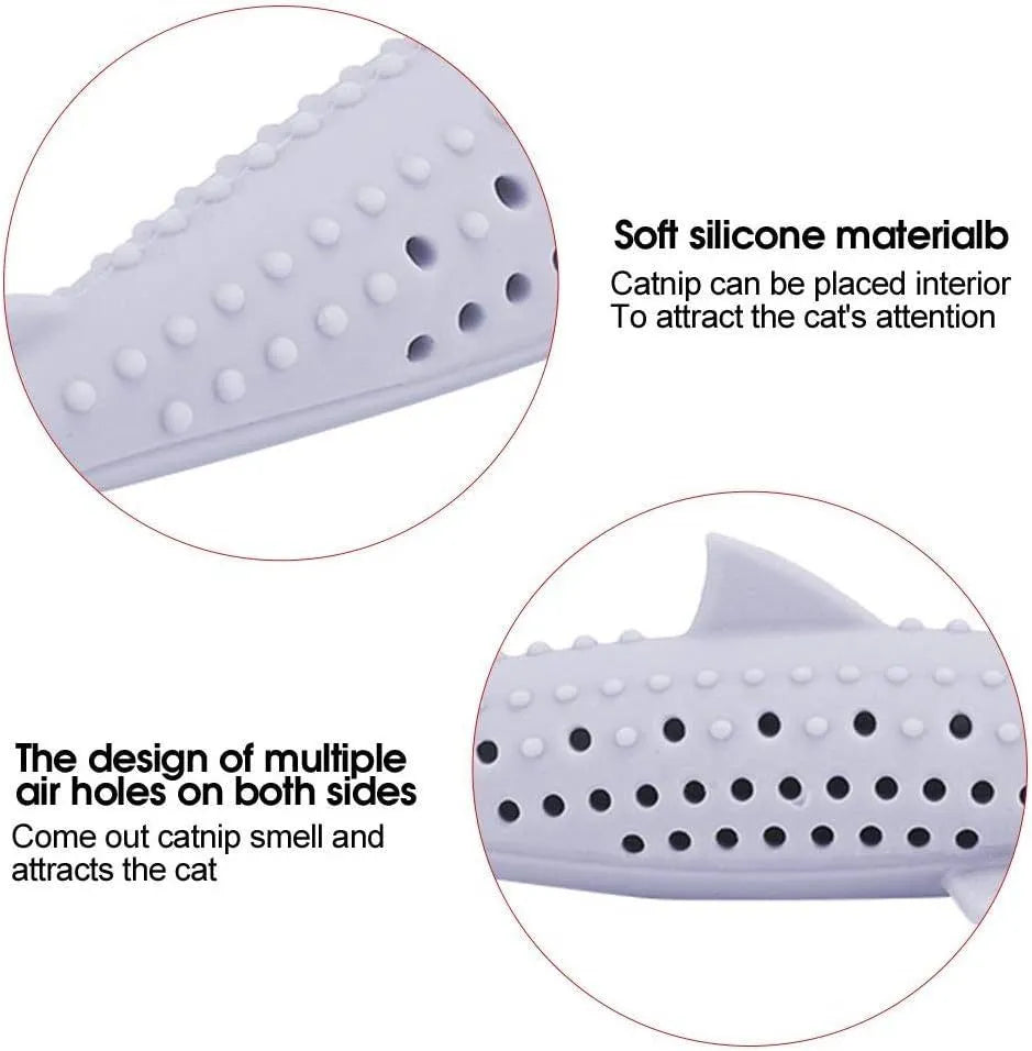 Green silicone fish-shaped cat chew toy with breathable side holes and catnip compartment, measuring 3.5x15.5cm