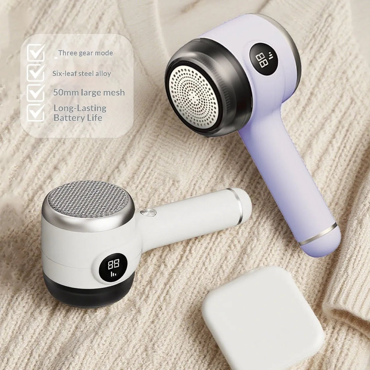 Rechargeable fur ball trimmer in white or purple with ABS body and charging cable for household fabric care