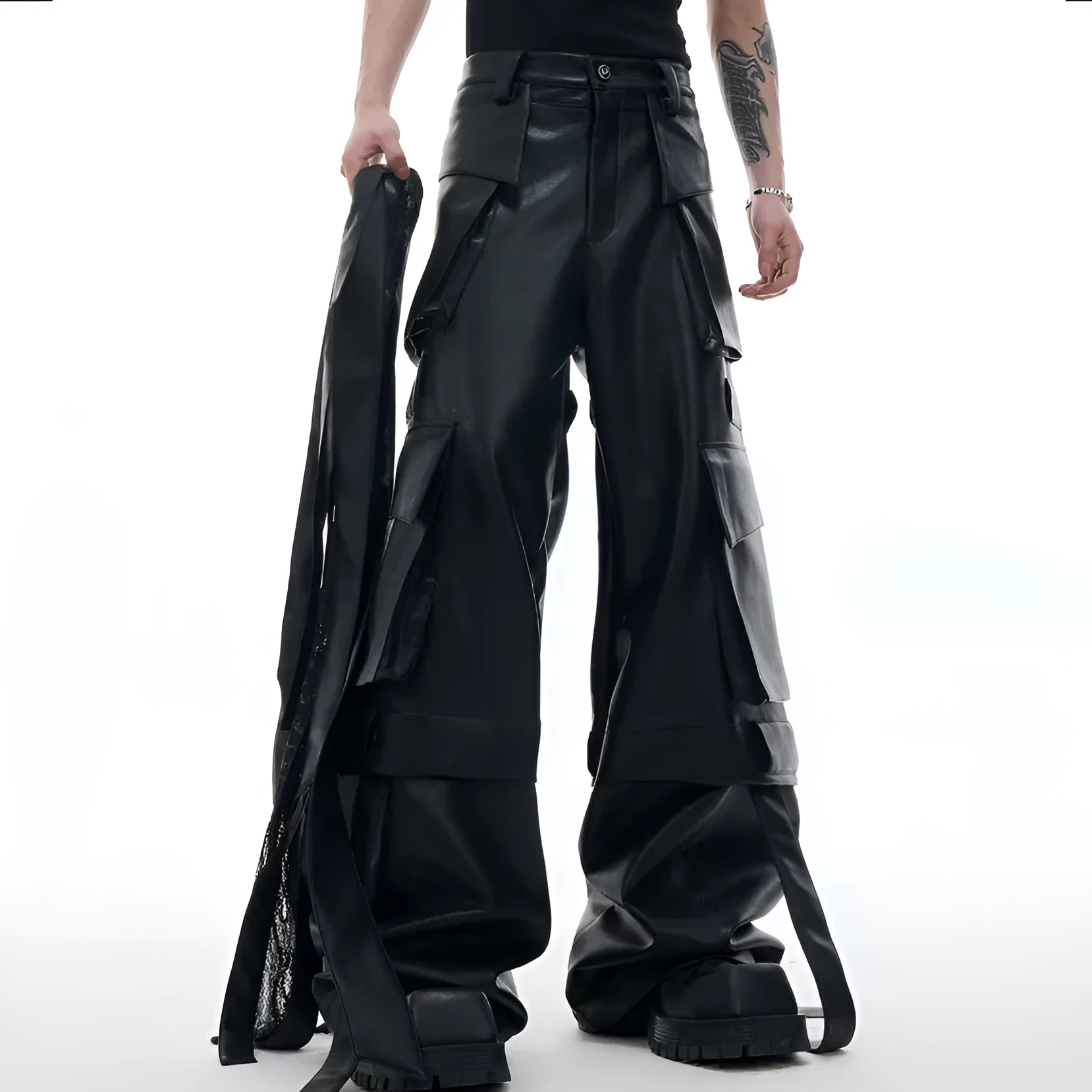 Black loose-fit multi-pocket trousers with quilted stitch detailing on a mannequin.