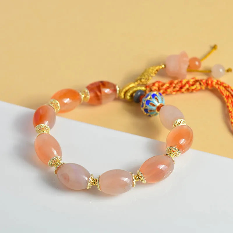 Handcrafted agate Tibetan bracelet with flower and geometric designs in vintage ethnic style