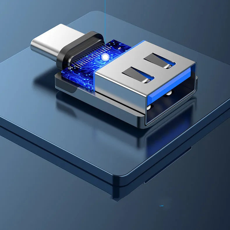 Grey aluminium alloy USB 3.0 Type-C Male to Type-A Female OTG adapter with attached lanyard.