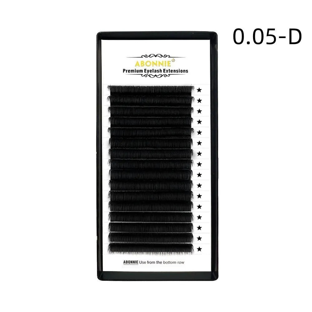 16-row dense false eyelashes made of mink hair in various lengths on a card.