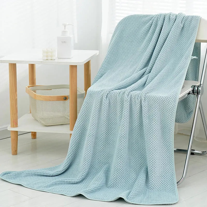 Pineapple plaid high density thick coral fleece microfibre beach towel in deep sea blue with edging finish