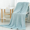 Pineapple plaid high density thick coral fleece microfibre beach towel in deep sea blue with edging finish