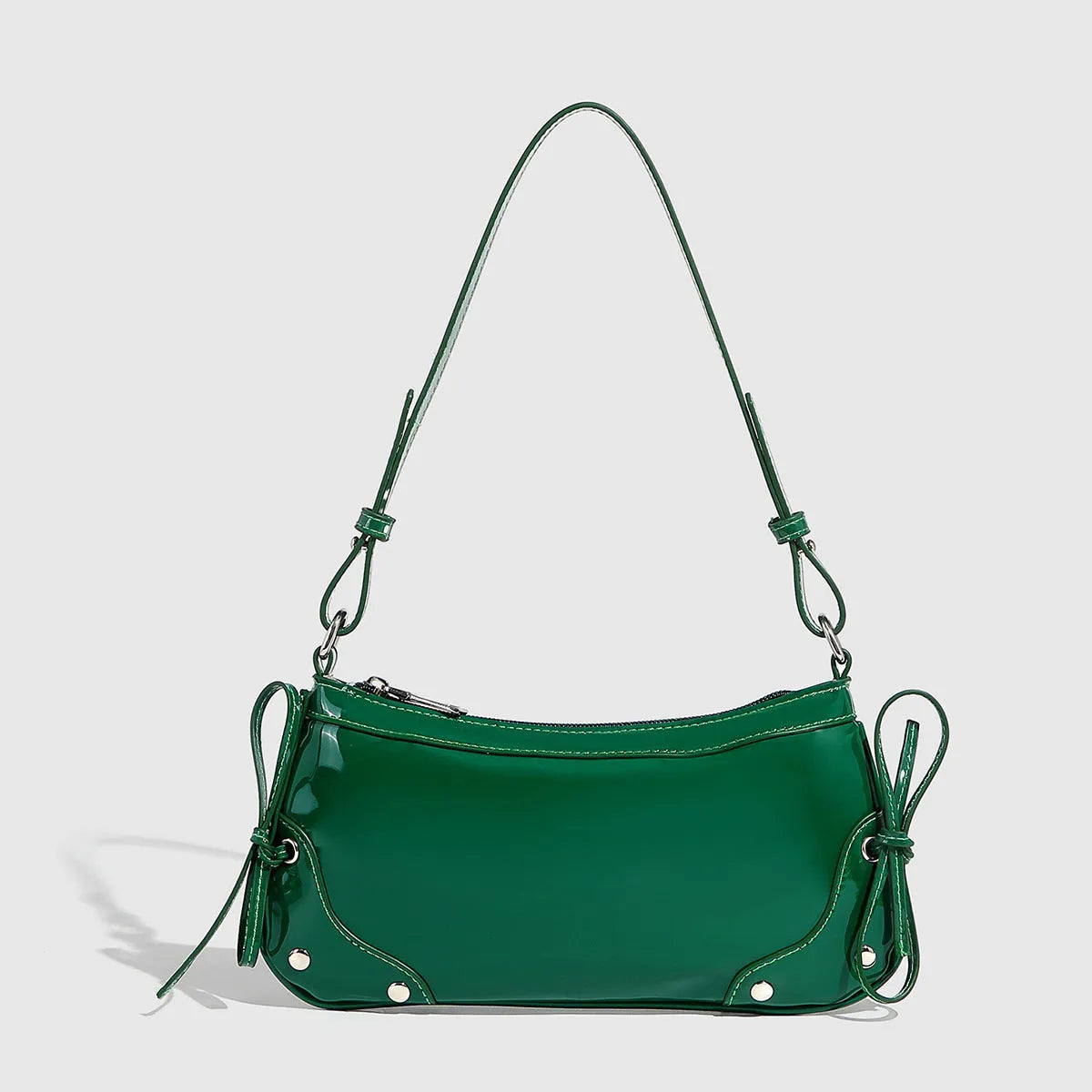 Solid colour PU underarm bag with double bow and rivet decoration, horizontal square shape