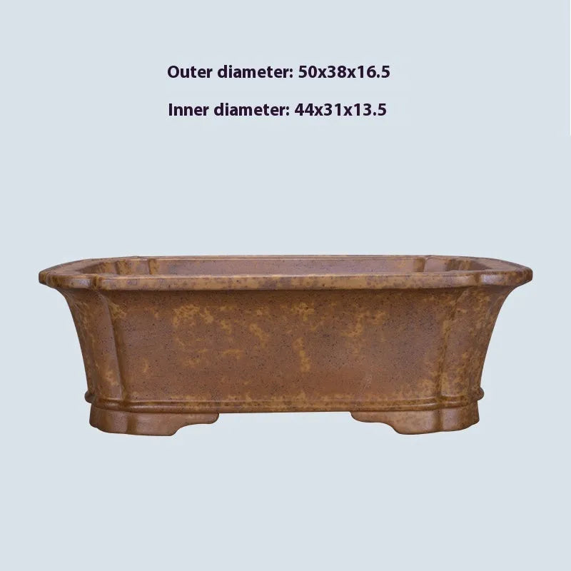 Large rectangular purple sand flowerpot with segment design and double-pump mechanism on floor.