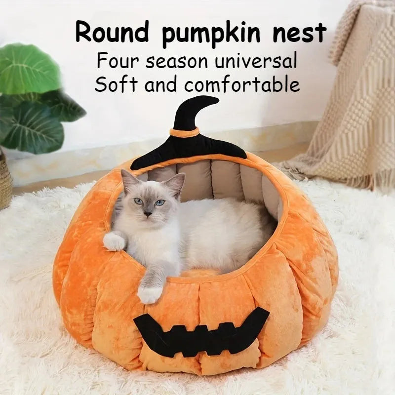 Halloween-themed orange pumpkin-shaped soft plush bed for a cat or small dog, featuring a cartoon devil design.