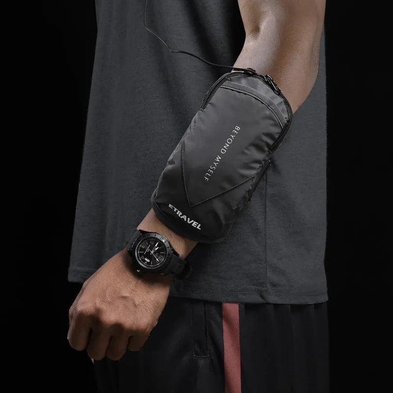 Black reflective running arm bag with adjustable strap, shown holding a mobile phone.