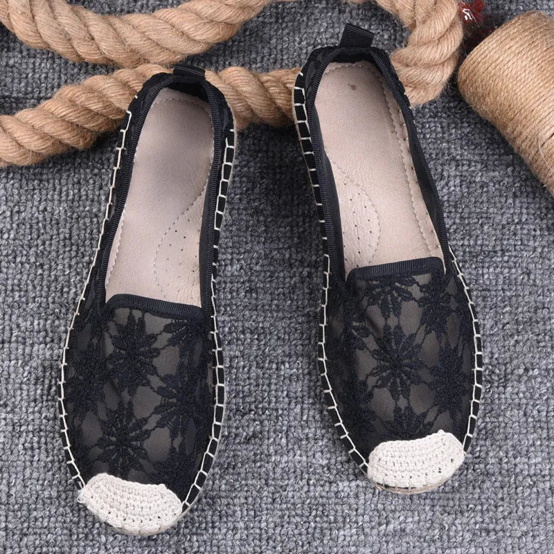 Women's flat linen fisherman shoes in white with a round toe and rubber sole.