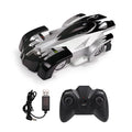 Remote control wall climbing car toy in black, blue, or red with wireless controller