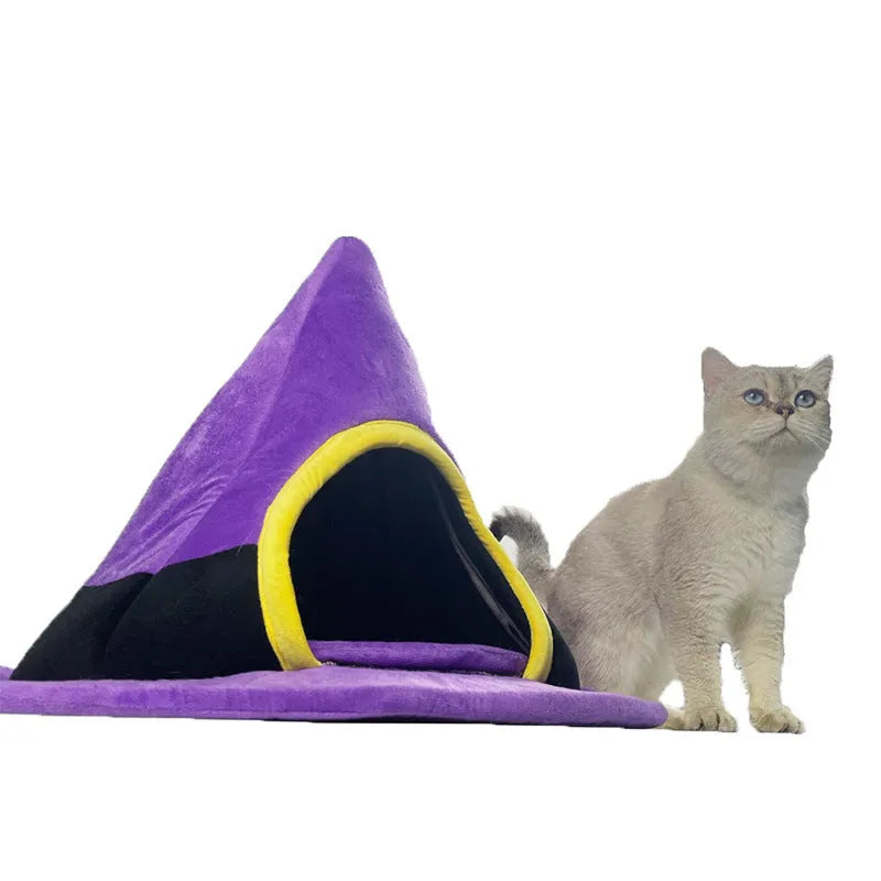 Purple cloth Halloween witch hat shaped cat bed for cats, measuring 60 by 45 centimetres.