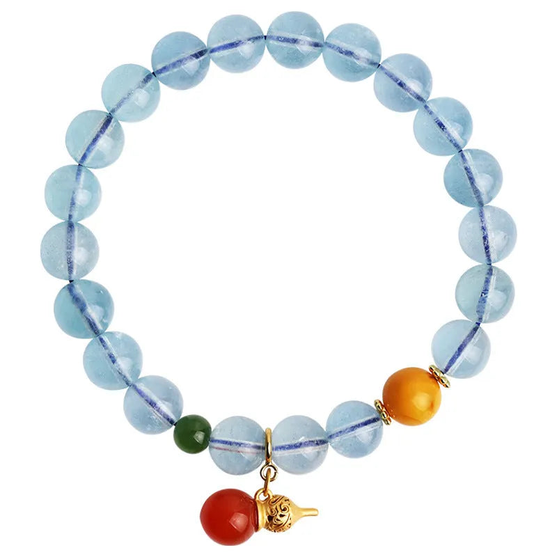 Women's geometric bracelet with blue 8mm aquamarine beads and ethnic retro design.
