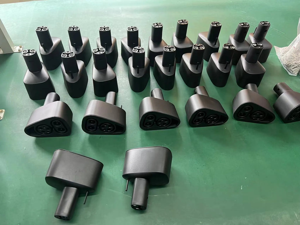 Black Tesla charging plug conversion adapter with American Standard connector, showing dimensions.