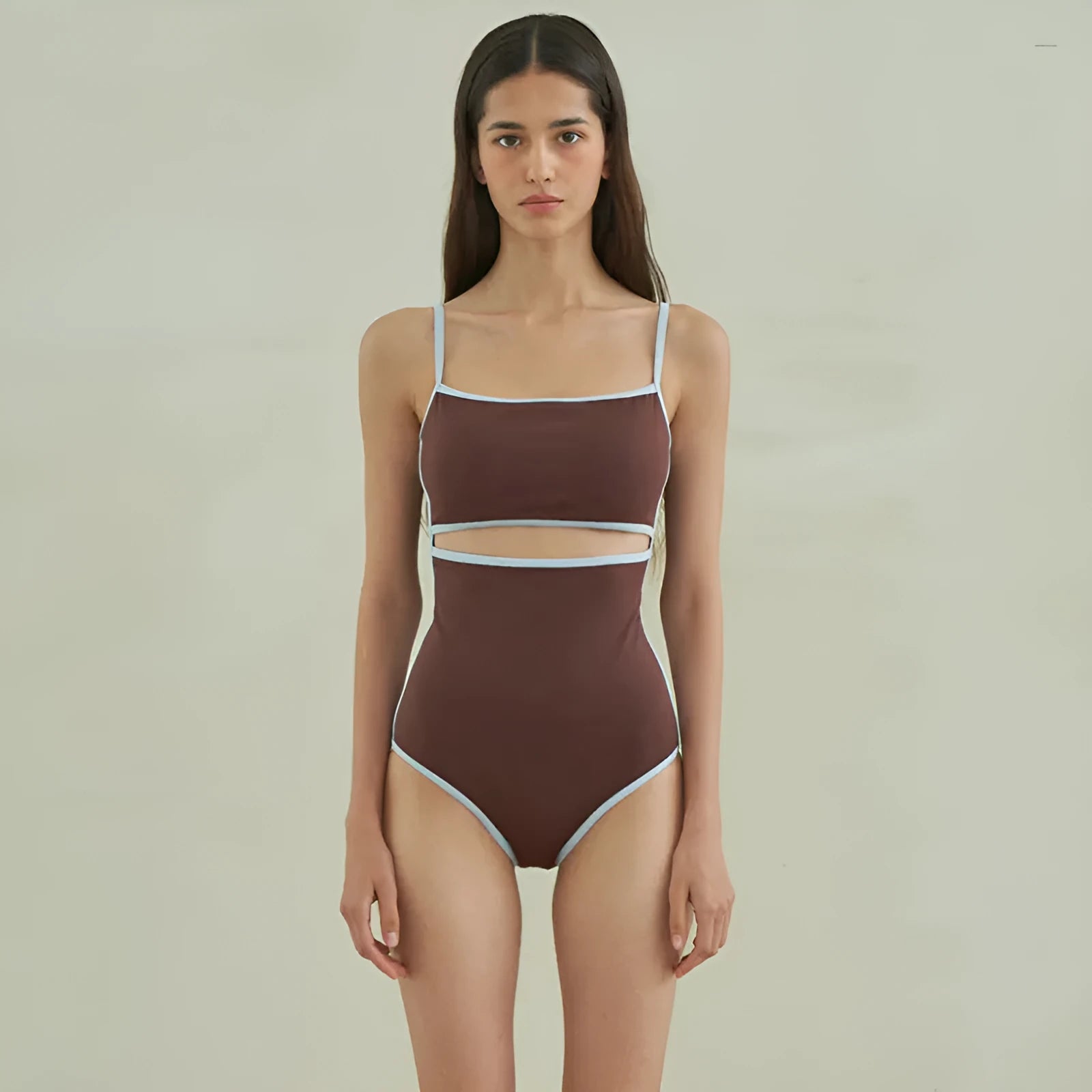 Brown triangle style one-piece swimsuit for women with sexy pattern