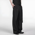 Black women's straight-leg trousers with a single pleat and adjustable waistband on a hanger.