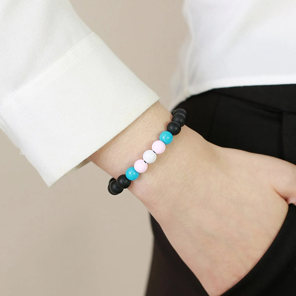 Polished black agate beaded bracelet with 8mm beads, unisex style, on a neutral background.