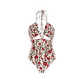 Women's two-piece swimsuit set with halter neck design and floral pattern gauze skirt