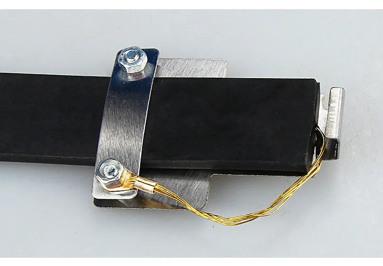 Black car electrostatic grounding belt, 37cm long with metal hook, shown against a vehicle tyre.