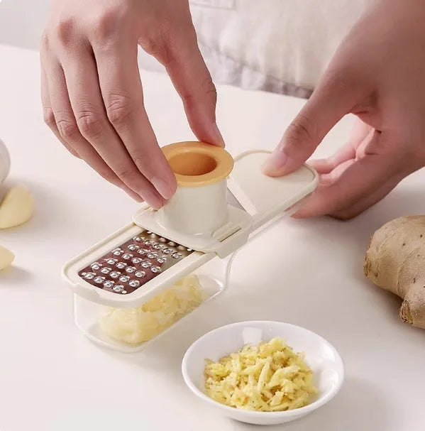 Three-in-one stainless steel ginger and garlic grinder with potato slicer, beige or green handle