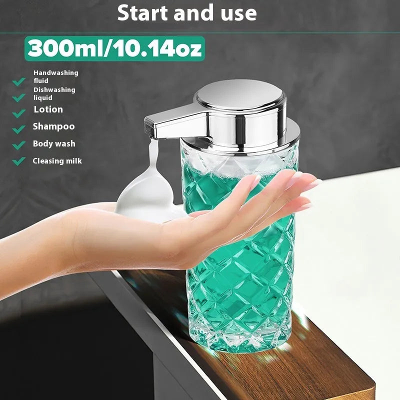 Silver automatic sensor soap dispenser with USB Type-C charging port on a bathroom counter.
