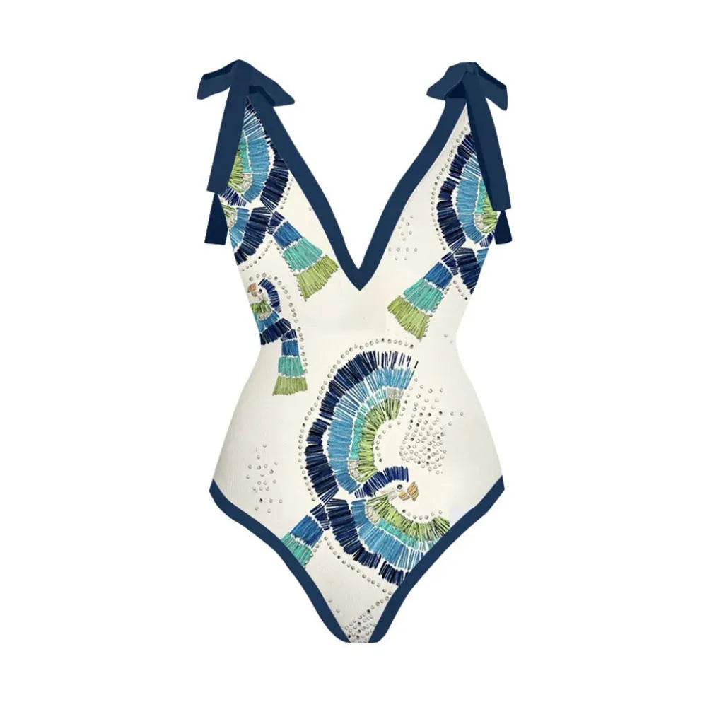 Blue French retro one-piece swimsuit with matching gauze skirt on a mannequin, backless design.