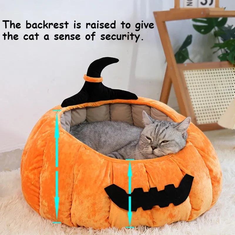 Halloween-themed orange pumpkin-shaped soft plush bed for a cat or small dog, featuring a cartoon devil design.