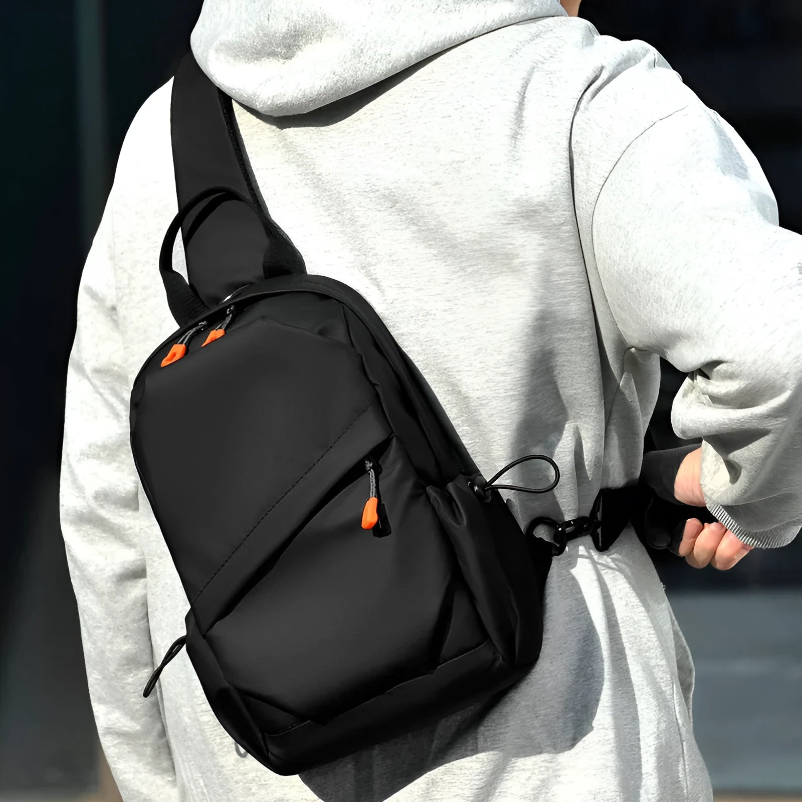 Men's black polyester crossbody bag with waterproof material and minimalist design