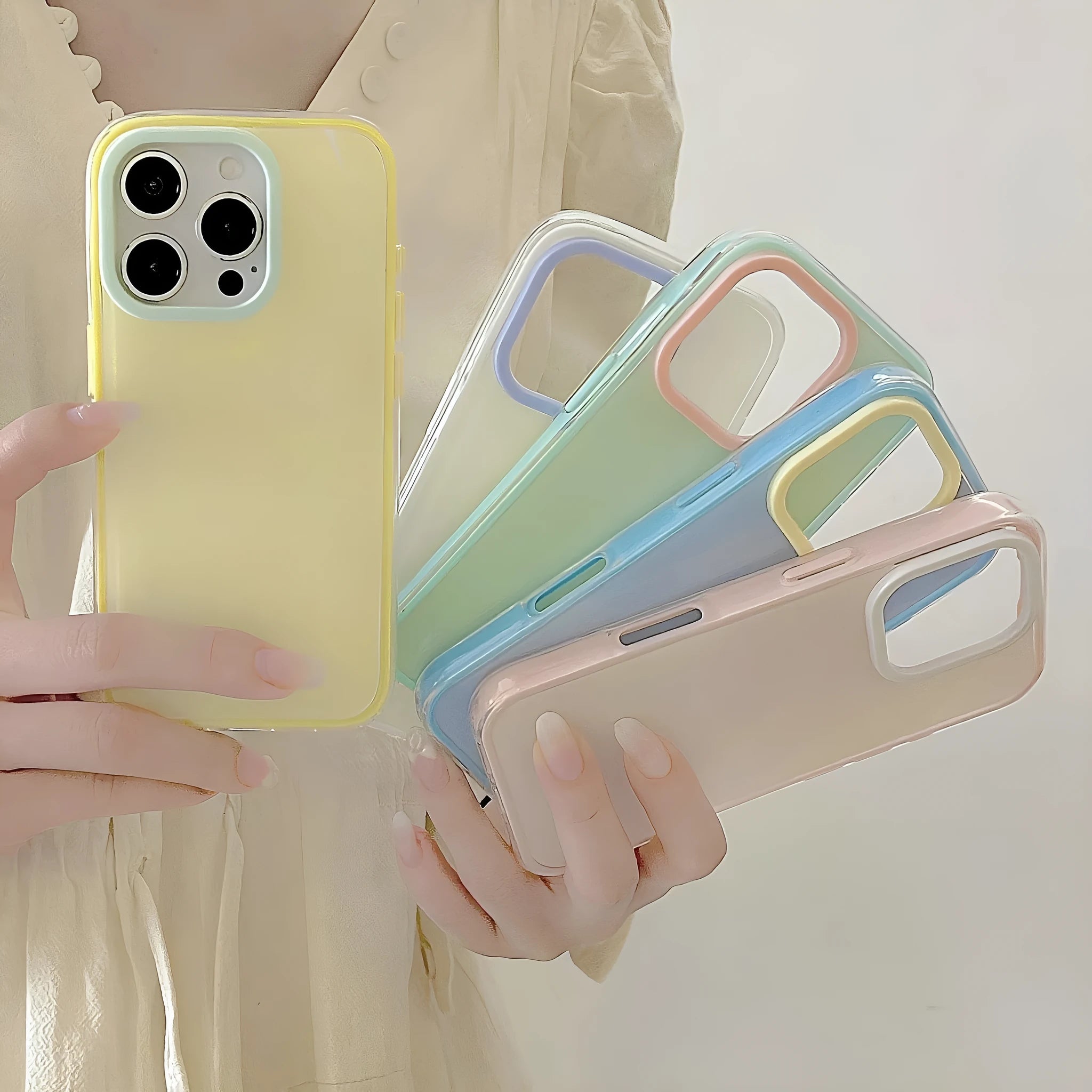 Solid colour transparent TPU jelly phone case for iPhone showing yellow, white, blue, pink, and green options