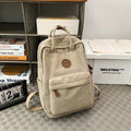 Retro unisex corduroy backpack in solid colour with breathable fabric, side view.