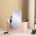 Pink gradient portable LED makeup mirror and organiser storage box with USB charging port.