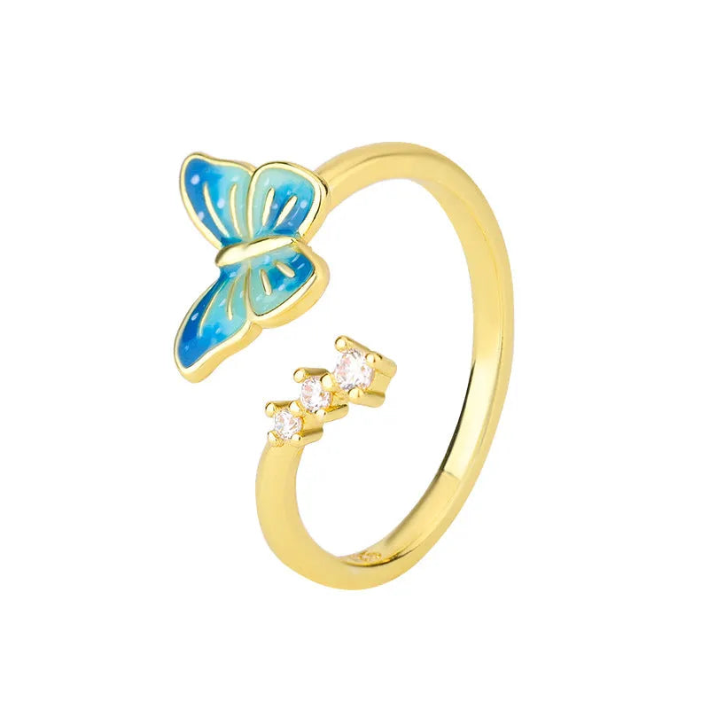 Copper butterfly ring with blue epoxy inlay, adjustable opening, silver colour, simple animal style
