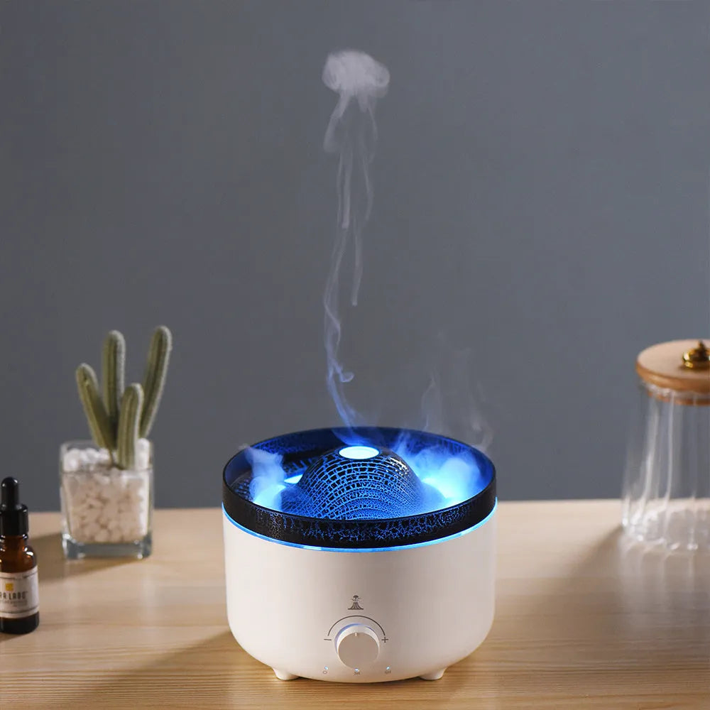 White simulated flame volcano humidifier with remote control showing orange and blue lighting effects