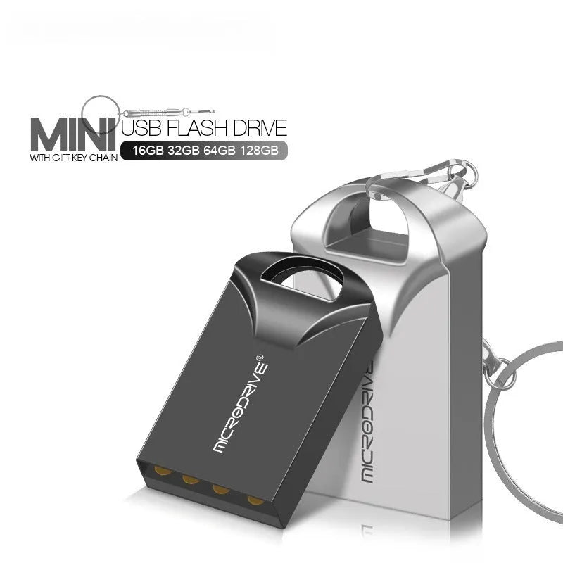Small silver and black metal USB flash drive on a white background