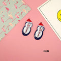 Children's metal hair barrette clip with colourful baked varnish strawberry print design.