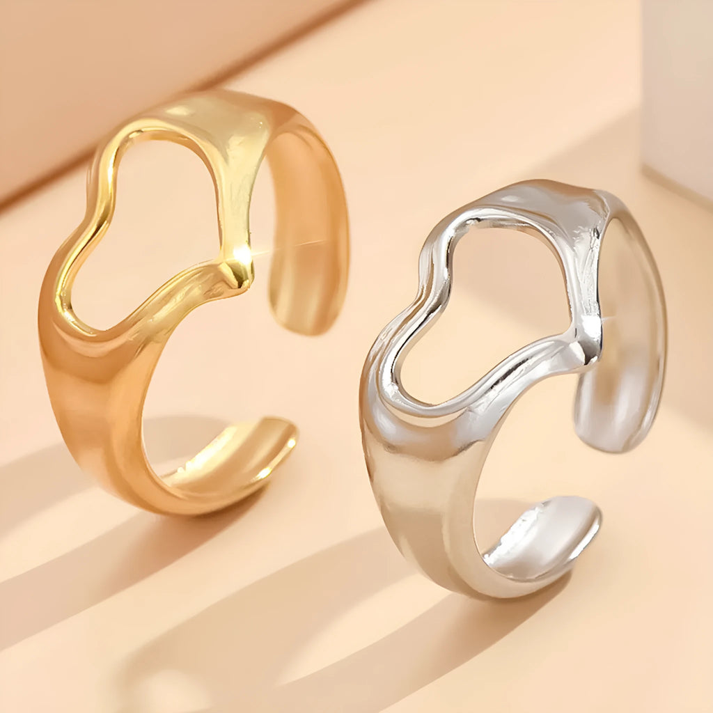 Adjustable hollow heart open ring in stainless steel with U-shaped band and rose motif, shown in steel or gold colour