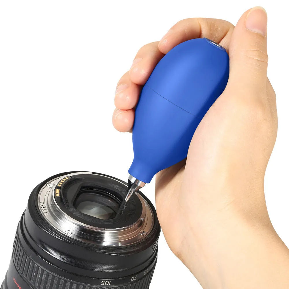 Blue and black rubber dust blower ball for cleaning cameras and mobile phones.