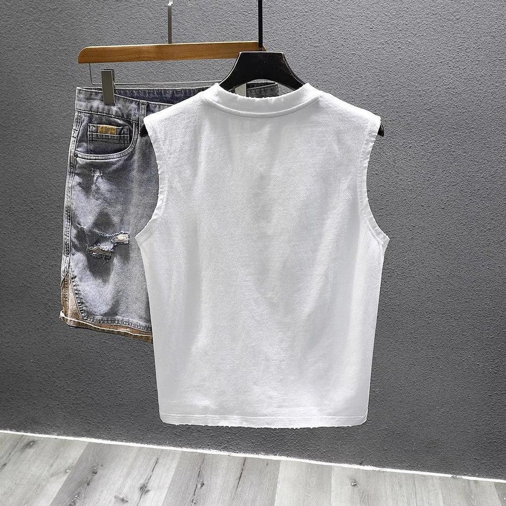 Men's solid black loose fit cotton sleeveless t-shirt with a straight hem.