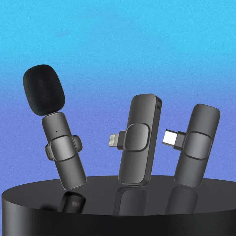 Wireless lavalier noise reduction microphone with clip, receiver, and Type C interface on white background