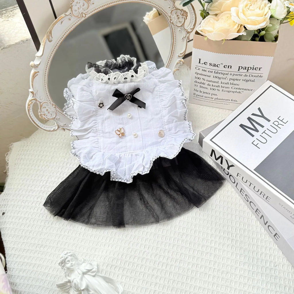 White princess-style dog dress with a gauze yarn skirt on a small dog, showing fit and style.
