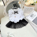 White princess-style dog dress with a gauze yarn skirt on a small dog, showing fit and style.