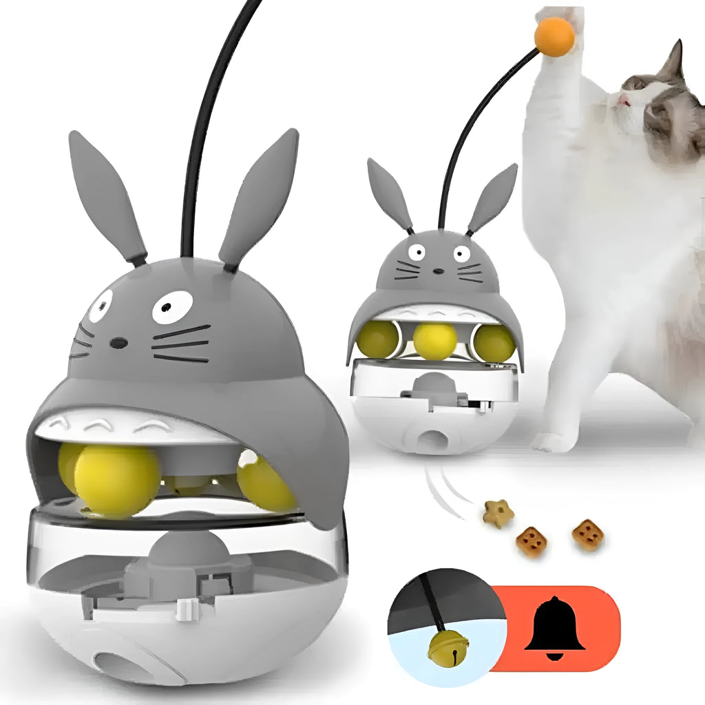 Interactive cat feeder toy with sounding bell and car tower shape in brown, grey, pink, and white