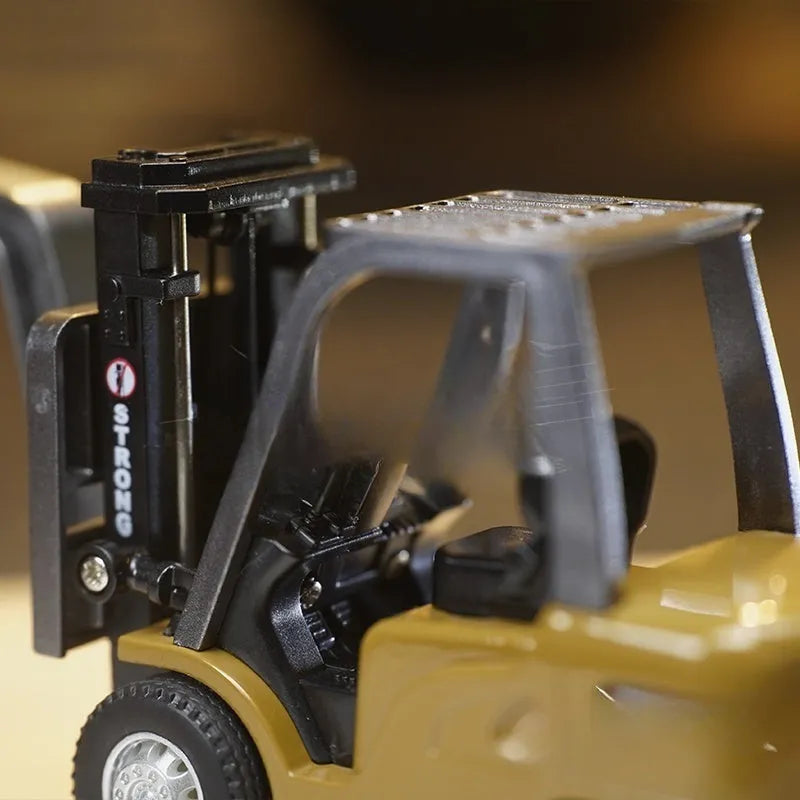 Alloy remote control engineering vehicle toy with mobile phone control, available as forklift, excavator or dumptruck for ages 7 to 14