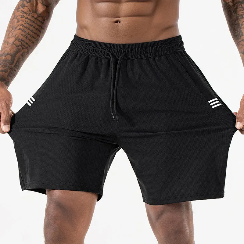 Men's black Ice Silk quick-drying sports shorts with a drawstring high waist on a hanger.