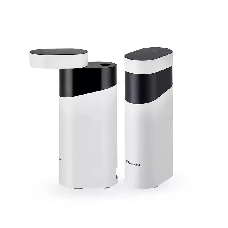 Small black or green instant hot water dispenser with Nano heating film on a desktop.