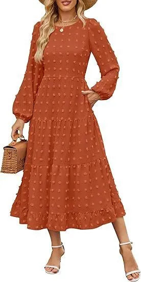 Women's beige long sleeve dress with ruffled sleeves and a high waist, shown on a hanger.
