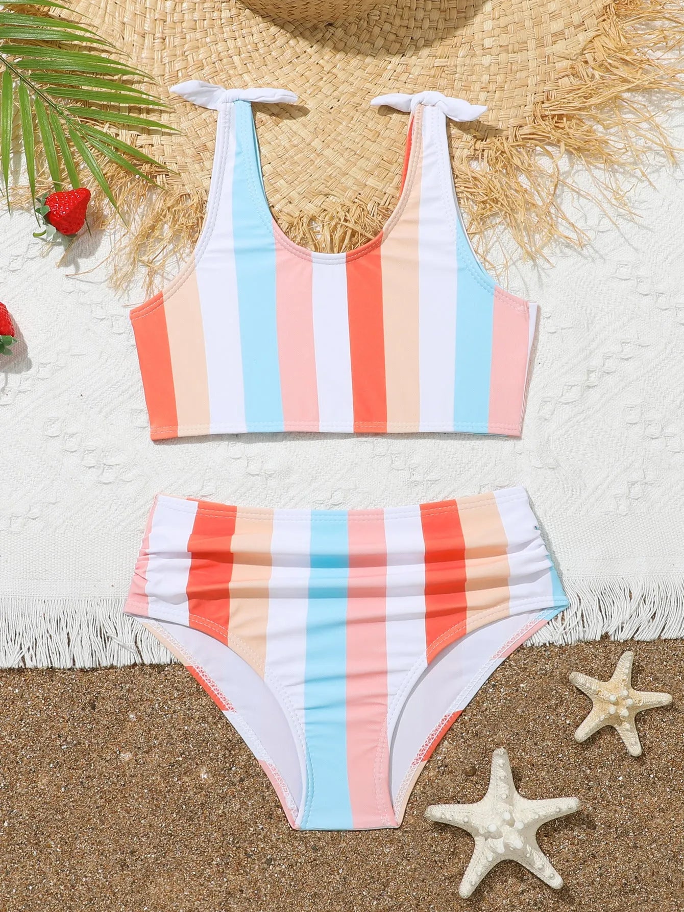 Girls' plaid print swimsuit briefs with polyester lining shown in multiple colour options