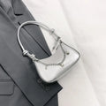 PU one-shoulder crossbody commuter bag horizontal square shape with chain accent in black