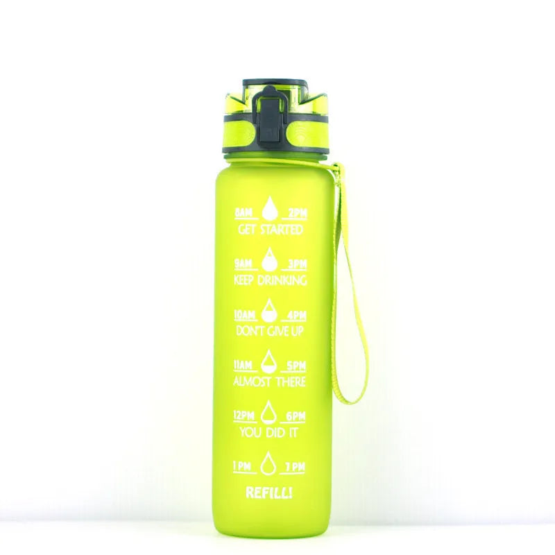 Transparent 1000ml plastic water bottle showing clear Tritan construction with visible liquid