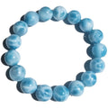 Blue handcrafted Bodhi bracelet with pearl accents, showing different bead size options.