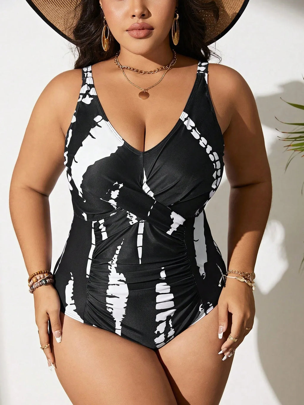 Black Siamese colour matching fit one-piece swimsuit for women on a size chart.